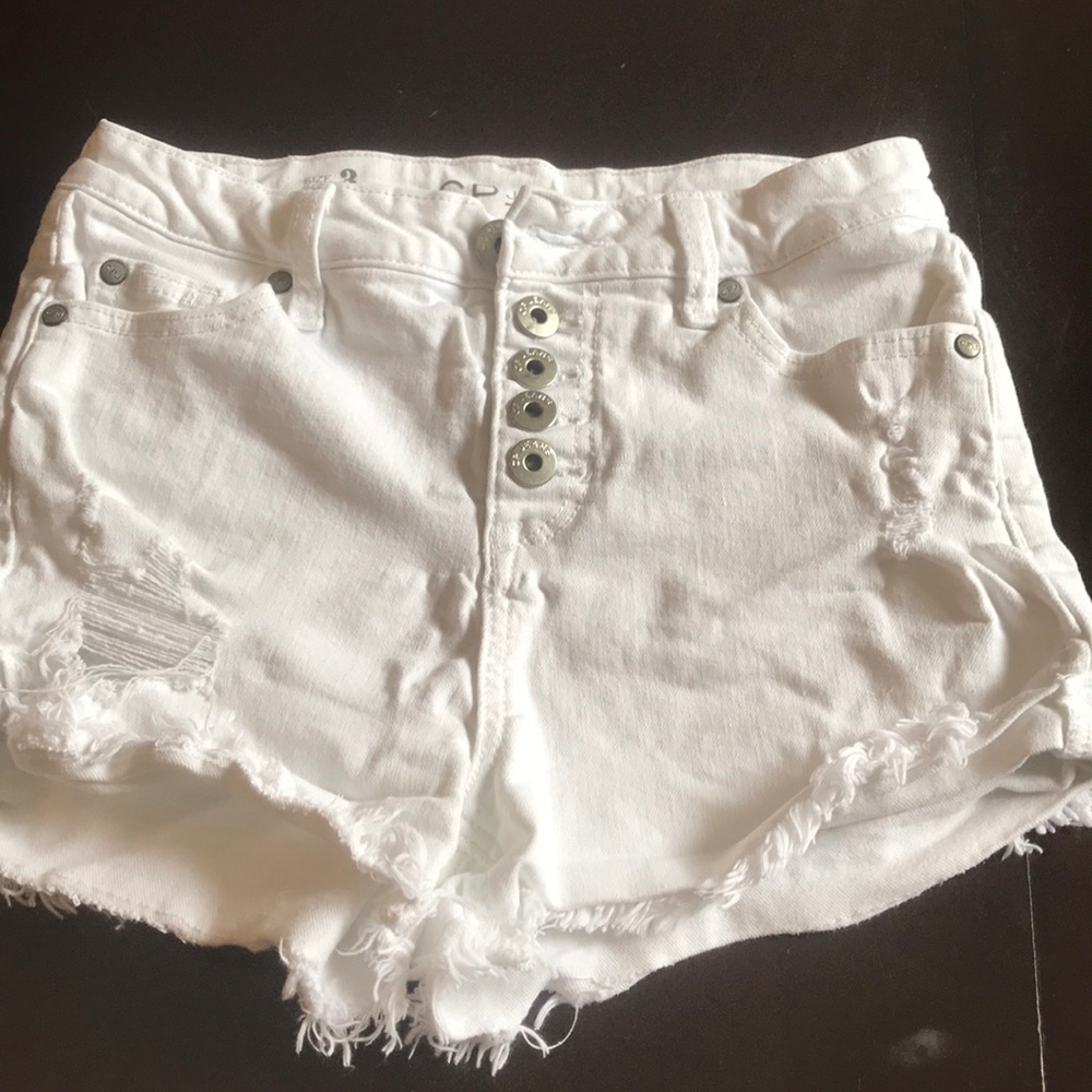 High waisted ripped white jean shorts